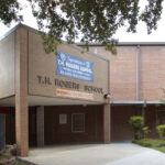 A photograph of the front entrance of T.H. Rogers School