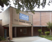 A photograph of the front entrance of T.H. Rogers School