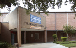 A photograph of the front entrance of T.H. Rogers School